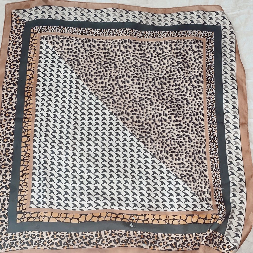Animal print silk scarf.